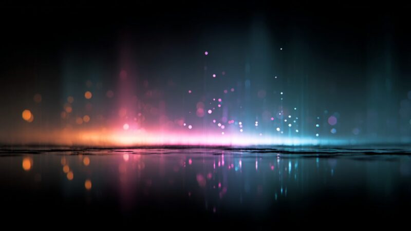 An abstract particle field glowing violet above a reflective floor
